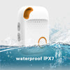 White and orange rectangular personal alarm device with buttons, partially submerged in splashing water.
