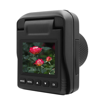 Black digital camera facing backward, displaying a photo of pink roses on its LCD screen, with control buttons.